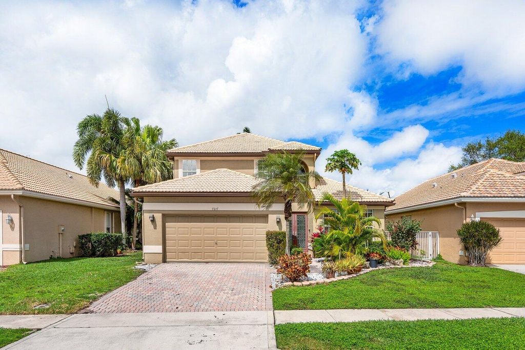 Photo of 7647 Doubleton Drive, Delray Beach, FL 33446 (MLS # R10965965)