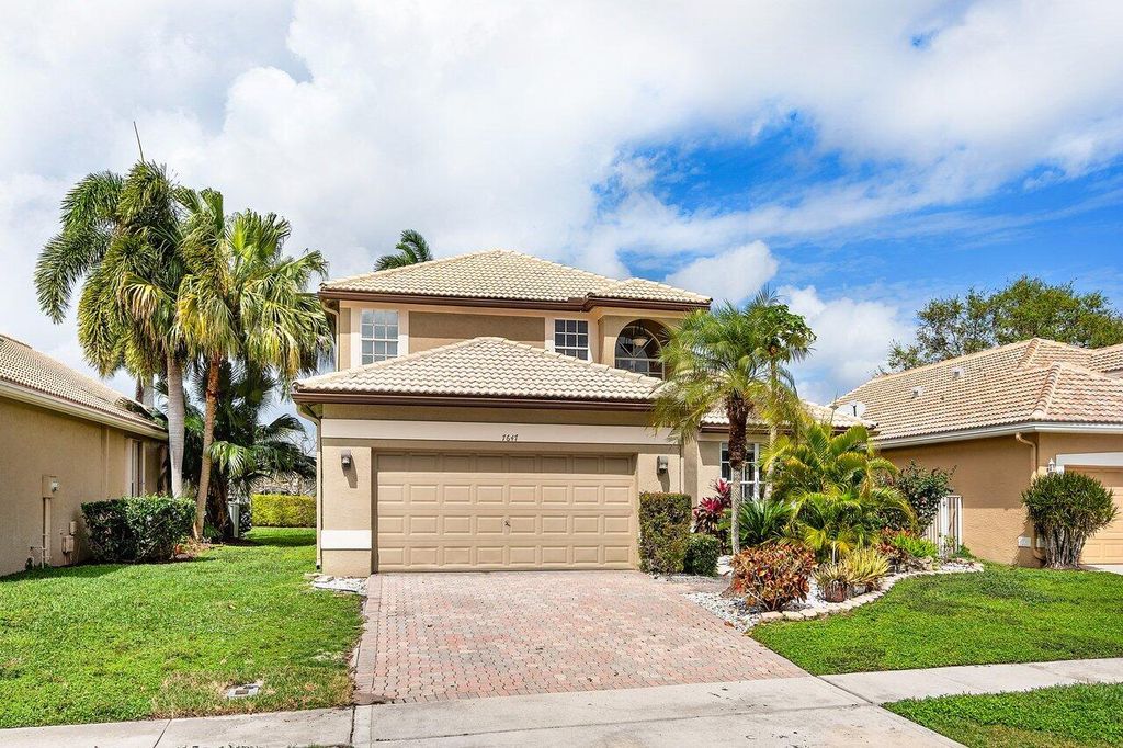 Photo of 7647 Doubleton Drive, Delray Beach, FL 33446 (MLS # R10965965)