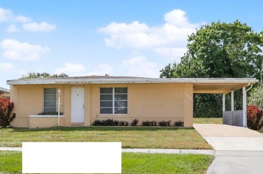 Photo of 150 NE Jardain Road, Port Saint Lucie, FL 34983 (MLS # R10759015)
