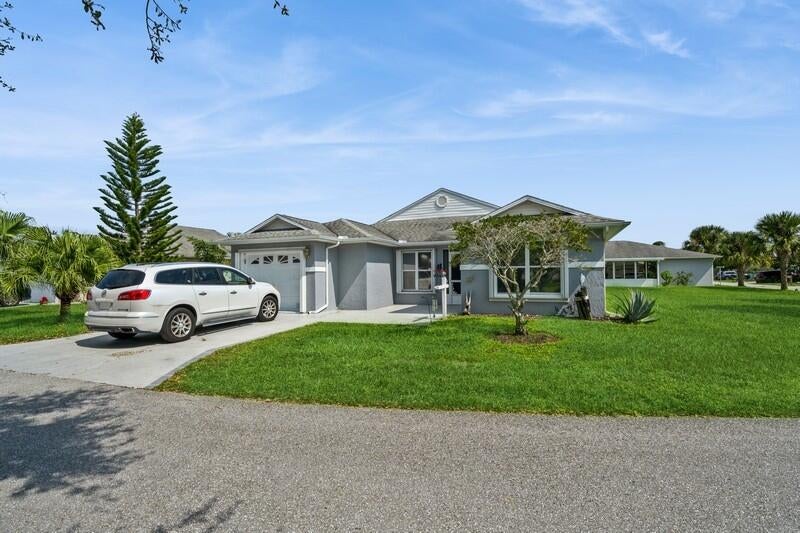Photo of 6659 NE Picante Circle, Fort Pierce, FL 34951 (MLS # R11029700)