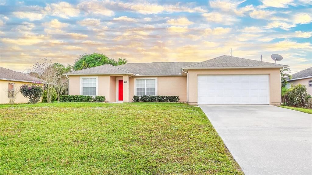 Photo of 580 SW Dailey Avenue, Port Saint Lucie, FL 34953 (MLS # R10765165)