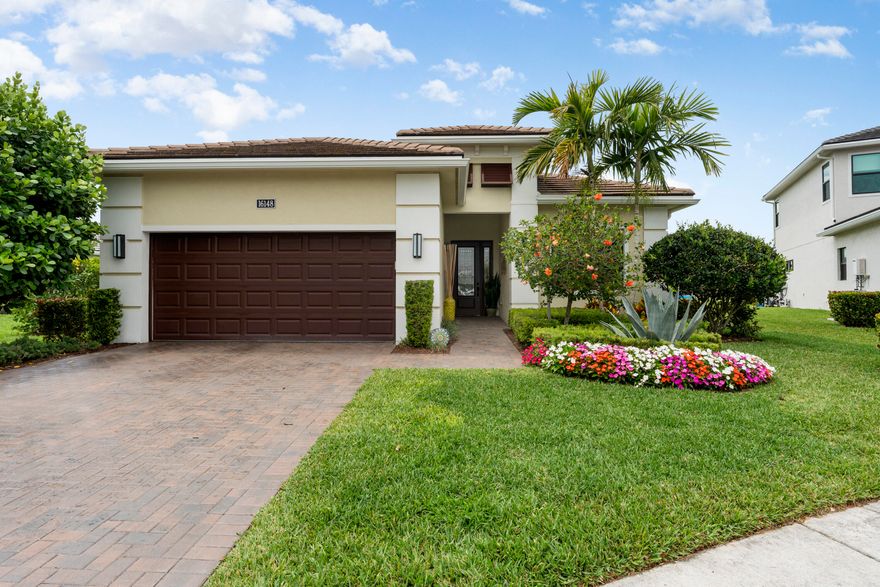 Set on a premium waterfront cul-de-sac lot with exceptional spacing between neighboring homes, this residence offers a rare combination of privacy, light, and refined design. Every detail has been thoughtfully elevated to create a clean, high-end living experience. A dramatic entry with impact glass double doors opens to a polished foyer featuring custom wall detailing and layered crown molding. Wide-plank flooring extends throughout the main living areas, enhancing the home's seamless, modern flow. The kitchen is a standout, designed with both function and style in mind. It features sleek, soft-close cabinetry in a neutral palette, quartz surfaces, and a full-height backsplash for a striking finish. A professional-grade gas range with designer hood anchors the space, complemented by built-in wall ovens, microwave, and an oversized single-basin sink. The large island, finished with custom detailing, serves as both a centerpiece and gathering space. The main living area is elevated by intricate ceiling work and refined millwork, creating a sophisticated yet welcoming environment. Custom window treatments complete the space while allowing for adjustable natural light. A private office or flex room sits behind glass French doors, offering a quiet, versatile space enhanced by modern lighting and a distinctive accent wall. Secondary living spaces continue the home's elevated feel. Guest bedrooms are well-proportioned with upgraded finishes, while bathrooms feature contemporary styling with quartz countertops, vessel-style sinks, and floor-to-ceiling tilework. One guest suite includes its own upgraded bath with a frameless glass shower for added comfort and privacy. The primary suite is designed as a retreat, featuring elegant ceiling detail, custom finishes, and a calm, airy atmosphere. The ensuite bath delivers a spa-like experience with dual vanities, quartz surfaces, a walk-in shower with designer tilework, and expansive mirrored walls. A fully built-out walk-in closet adds both convenience and luxury. Additional highlights include an oversized laundry room with extensive cabinetry, workspace, and utility sink—designed for both efficiency and organization. Outdoor living is equally impressive, with a covered lanai overlooking tranquil water views and open green space. Motorized screening allows for year-round enjoyment, creating a seamless indoor-outdoor experience ideal for entertaining or quiet relaxation. The generous lot placement enhances the sense of privacy, offering a peaceful backdrop rarely found in community living. This residence delivers a refined balance of design, comfort, and location—set within a sought-after, amenity-rich community offering resort-style pools, fitness facilities, racquet sports, and vibrant social spaces. A distinctive opportunity for those seeking elevated living in a premier setting. All in the Prestigious Cresswind at Westlake, a residential community offering a range of amenities tailored for active adults 55+. World-class amenities, Clubhouse, Very active community, Silver Award Winner - Best of 55+ Housing Awards (National Association of Home Builders)" "2021 "Top 100 Places to Live" (ideal Living Magazine)" The community clubhouse, managed by a full-time lifestyle director, offers a SmartFIT Training Center powered by EGYM, event and game rooms, an arts and crafts studio, pickleball and tennis courts, a dog park, resort-style and resistance pools, a spa, outdoor event plaza, and much more.  Westlake Adventure Park amenities include a lagoon pool with a 3-story slide, a splash pad, cabanas, lawn space for parties, an outdoor concert pavilion, basketball courts, an adult pool clubhouse (lodge), a playground, a dog park. As an owner, you also have access to Westlake's Adventure Park.  Cresswind HOA covers lawn maintenance, internet and the community amenities. Foyer Chandelier and Wall Sconce do not convey with the sale of the home