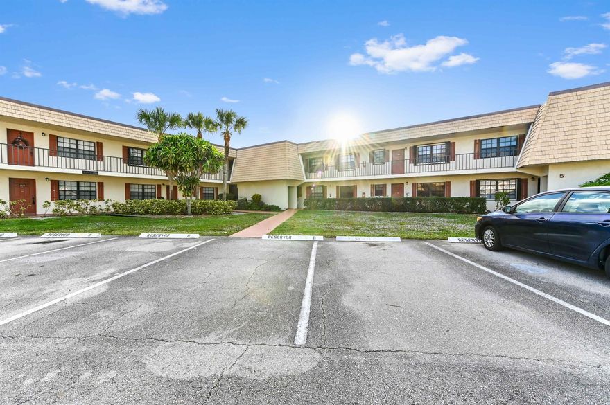 Discover the perfect blend of comfort and convenience in this immaculate, move-in-ready, first-floor condo, offering easy access without a single stair to climb. Step inside to find a bright and airy stack-bedroom layout that features pristine ceramic tile flooring throughout, ensuring a cool and low-maintenance lifestyle year-round. The heart of the home is the charming kitchen, distinguished by a unique tray ceiling that adds a touch of architectural elegance to your culinary space. Peace of mind is paramount here, with complete accordion shutters on all windows and doors for effortless storm protection.