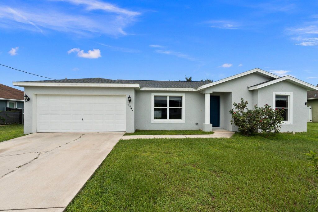 Photo of 621 SW Estate Avenue, Port St Lucie, FL 34953 (MLS # R10915820)