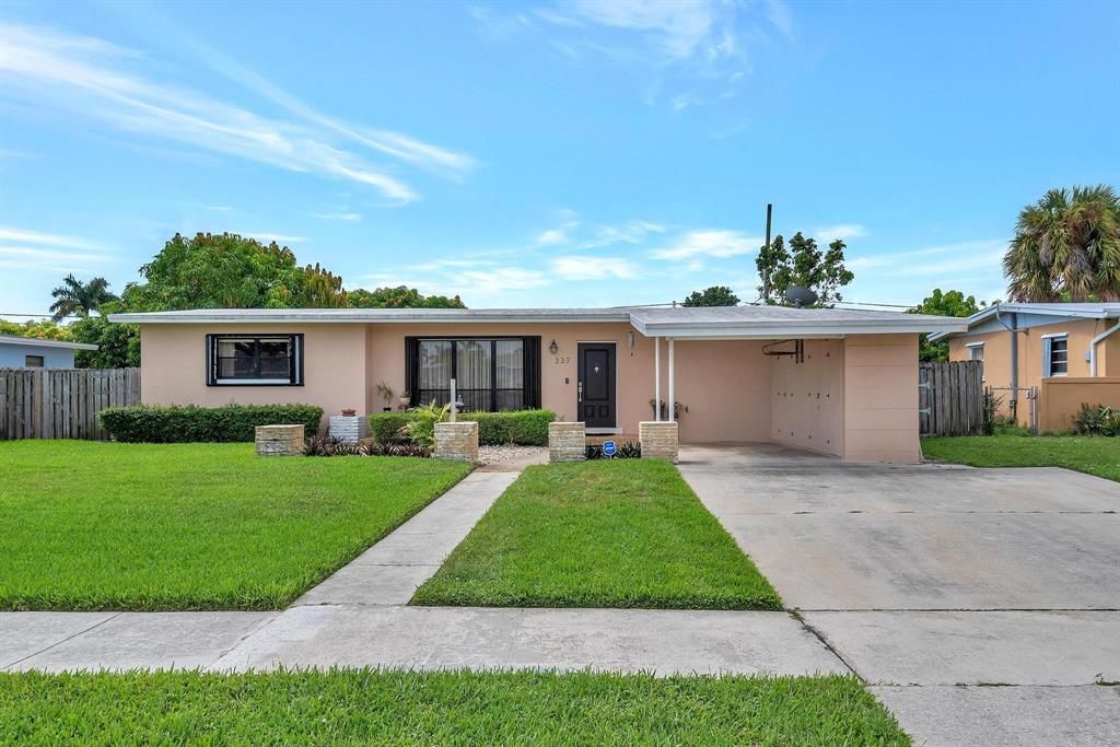 Photo of 337 Shady Lane Road Rd, Palm Springs, FL 33461 (MLS # R10830049)