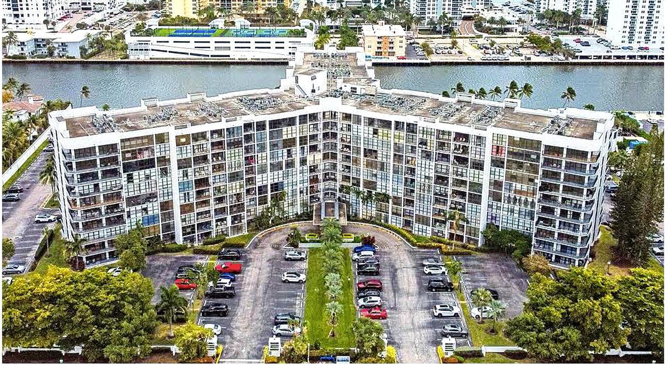 Great Investment Opportunity! Spacious 1BR+Den/1.5BA condo in desirable Three Islands community. Bright unit with tiled floors, private balcony, bistro-style eat-in kitchen, large walk-in closet, and ample storage. Building sits on the Intracoastal canal, close to parks, beaches, shopping, dining, Gulfstream Park, Aventura Mall, US-1, and I-95. Enjoy resort-style amenities including pool, fitness center, tennis courts, and social hall. Currently occupied by great tenants--perfect for investors or end-users seeking comfort, convenience, and lifestyle!