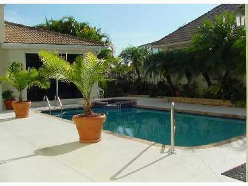 Photo of 9067 Long Lake Palm Drive, Boca Raton, FL 33496 (MLS # B26028715)
