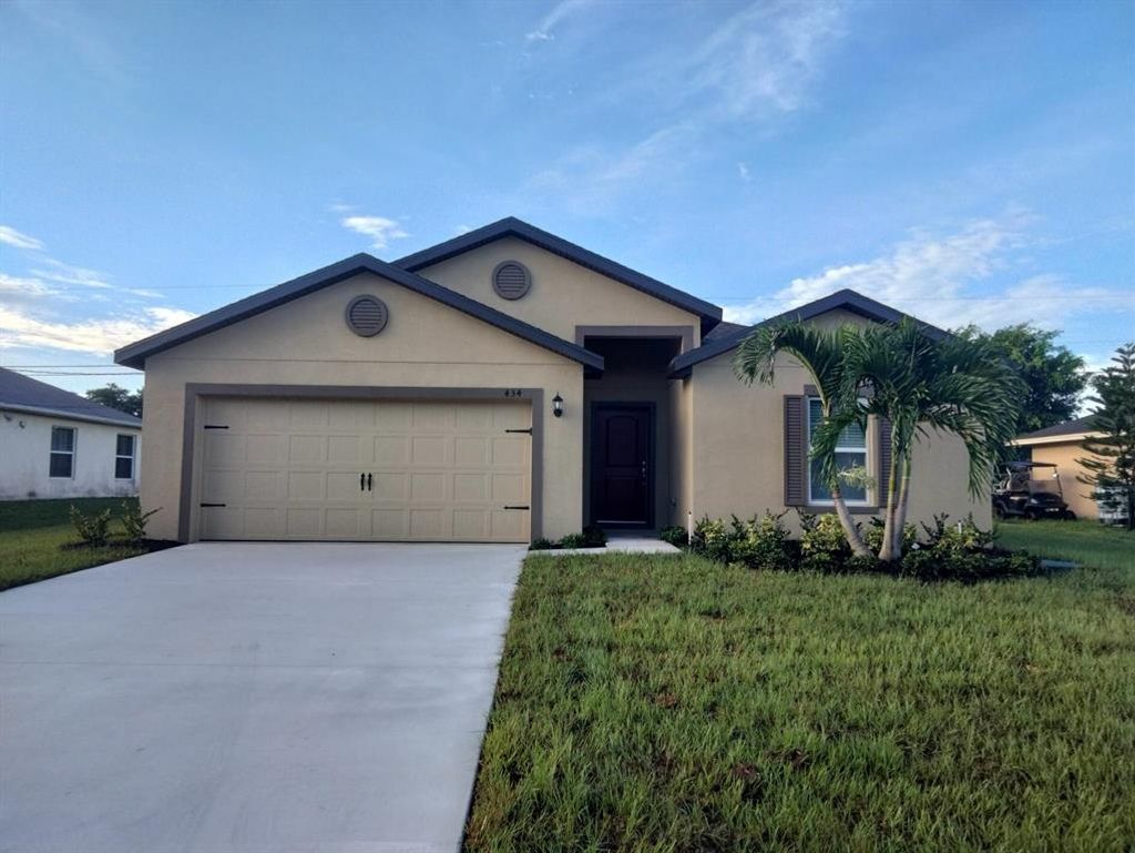 Photo of 434 SW Columbus Drive, Port Saint Lucie, FL 34953 (MLS # R10831868)