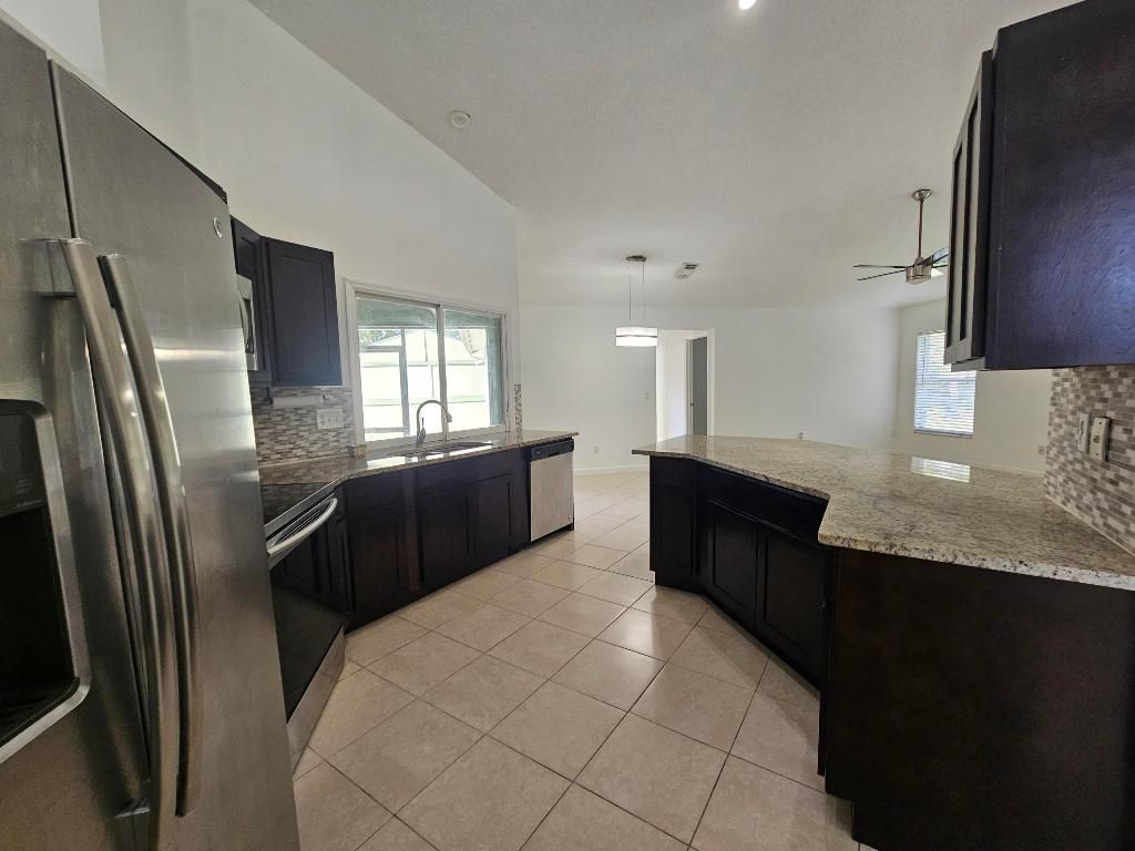 Photo of 3215 SE Pinto Street, Port Saint Lucie, FL 34983 (MLS # R11136651)