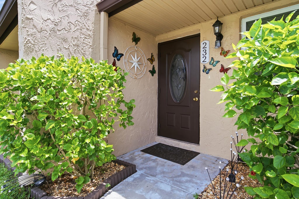 Photo of 232 Lake Meryl Drive, West Palm Beach, FL 33411 (MLS # B26055554)