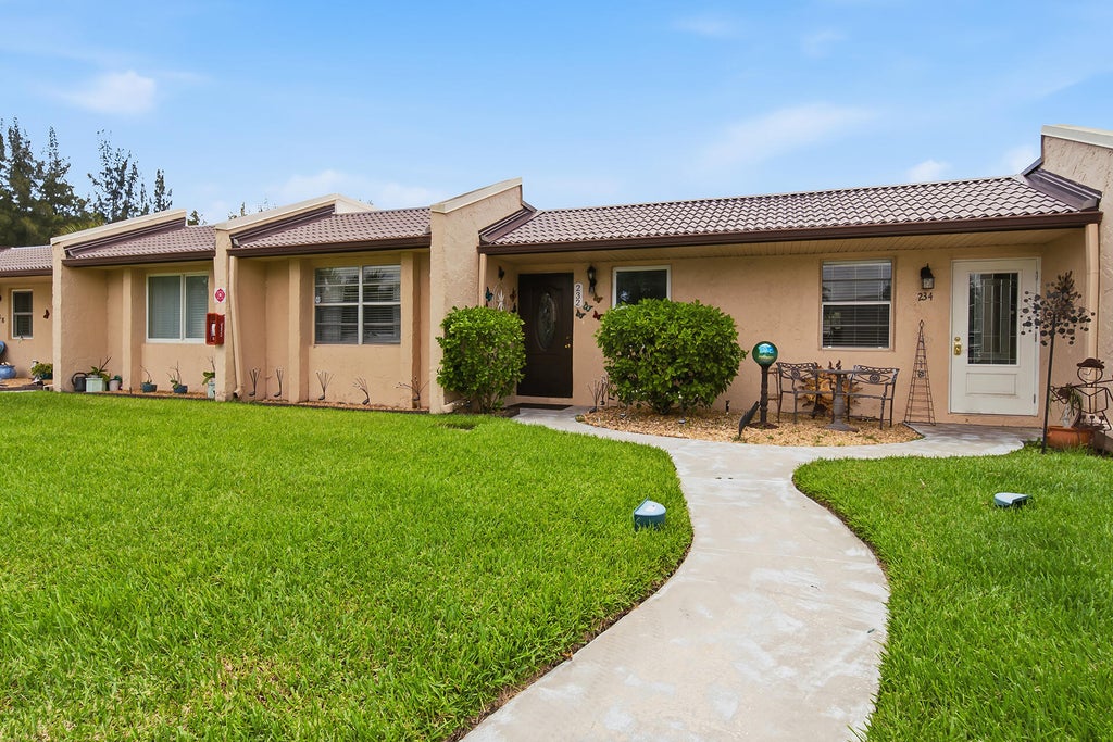 Photo of 232 Lake Meryl Drive, West Palm Beach, FL 33411 (MLS # B26055554)