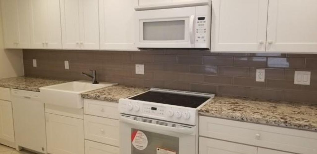 Photo of 2801 Victoria Way #J4, Coconut Creek, FL 33066 (MLS # F10530119)