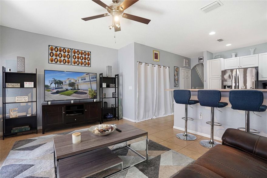 *Ask about how to qualify for $7,500 lender grant* Discover Cambridge Park offers community pool, tot lot & fitness stations all conveniently located near Commercial Blvd., the turnpike, & I-95. Meticulous townhome with newer appliances, natural lighting and quiet neighborhood. Dozens of guest parking, surrounded by new construction developments and more! Upstairs the expansive loft area (13x18), offering versatile possibilities as a home office, library, or additional living space. The owner's suite & Jr. suite complete the upstairs, ensuring comfort and privacy. Newer kitchen appliances, no carpet, all tile downstairs and luxury vinyl plank tile upstairs and extremely meticulous home.