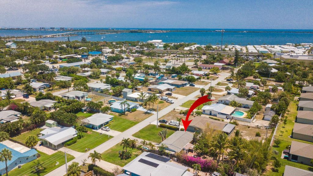 Photo of 1612 NE South Street, Jensen Beach, FL 34957 (MLS # R10986594)