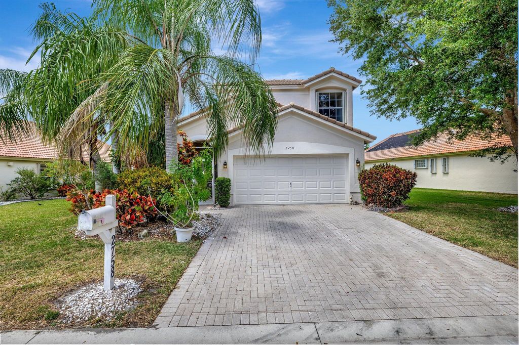 Photo of 2758 Pointe Circle, Greenacres, FL 33413 (MLS # R10981879)