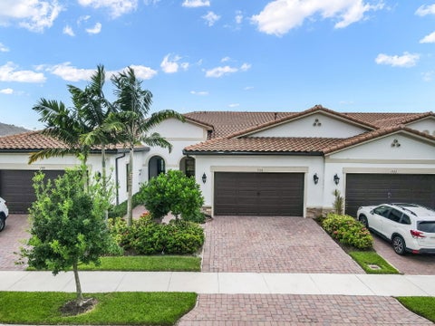 Photo of 7520 N BLUE SPRING Drive, Parkland, FL 33067 (MLS # B26061912)