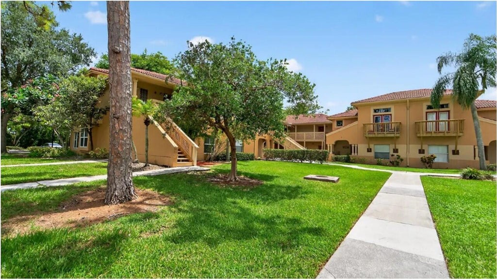 Photo of 4751 VIA PALM Lakes #409, West Palm Beach, FL 33417 (MLS # B26082517)
