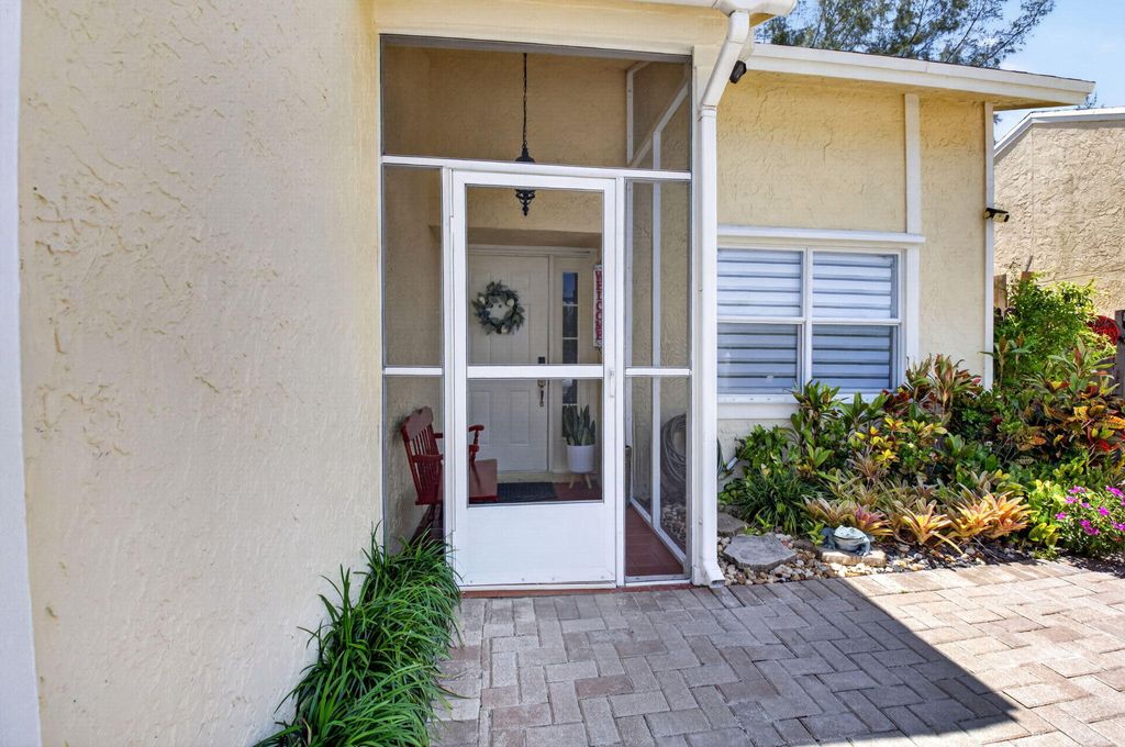Photo of 22859 N Sandalfoot Boulevard, Boca Raton, FL 33428 (MLS # B26024119)