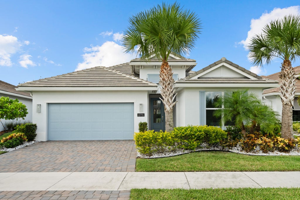 Photo of 12735 SW SUNRISE LAKE Terrace, Port Saint Lucie, FL 34987 (MLS # B26071152)