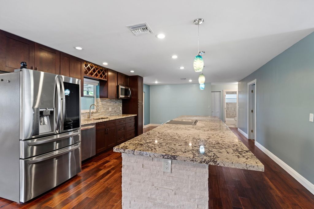 Photo of 2996 Cardinal Drive, Delray Beach, FL 33444 (MLS # B26027038)