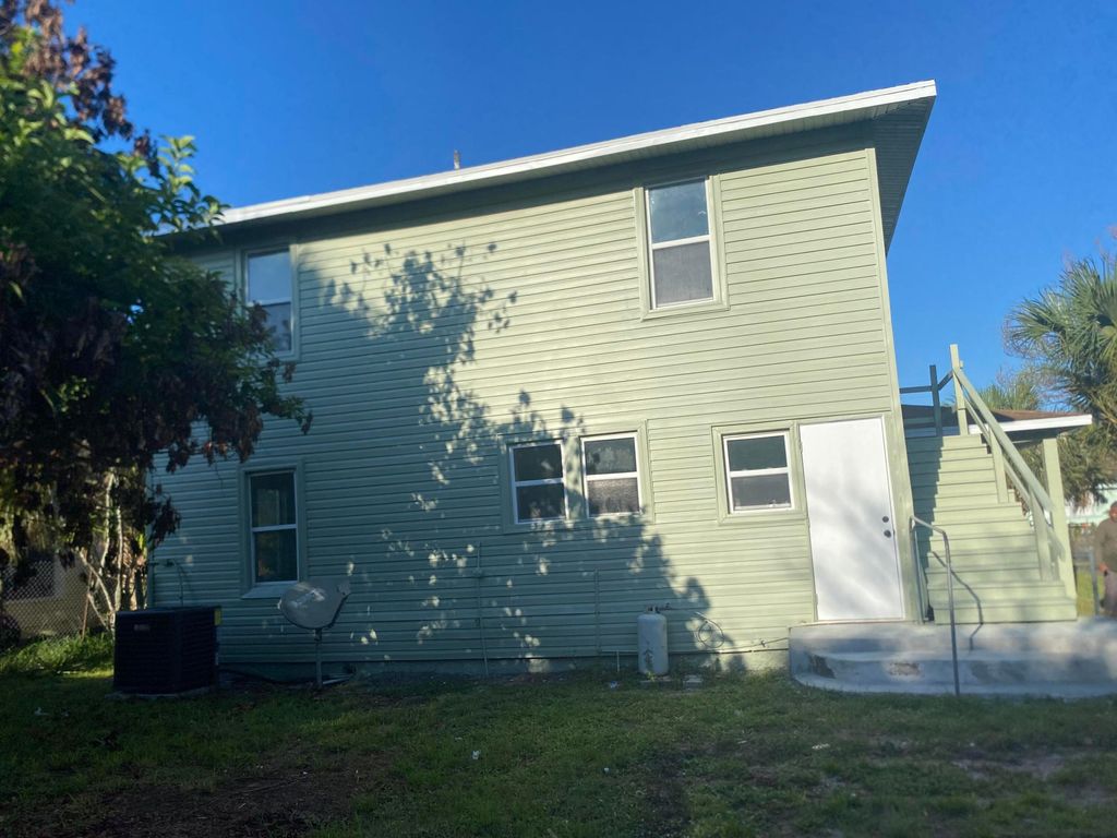 Photo of 319 N 11th Street, Fort Pierce, FL 34950 (MLS # B26014790)