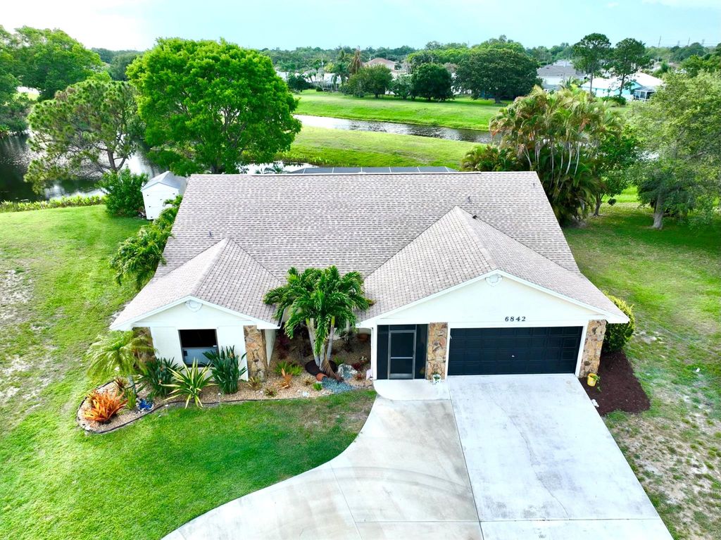 Photo of 6842 NW Granger Avenue, Port St Lucie, FL 34983 (MLS # R10890971)