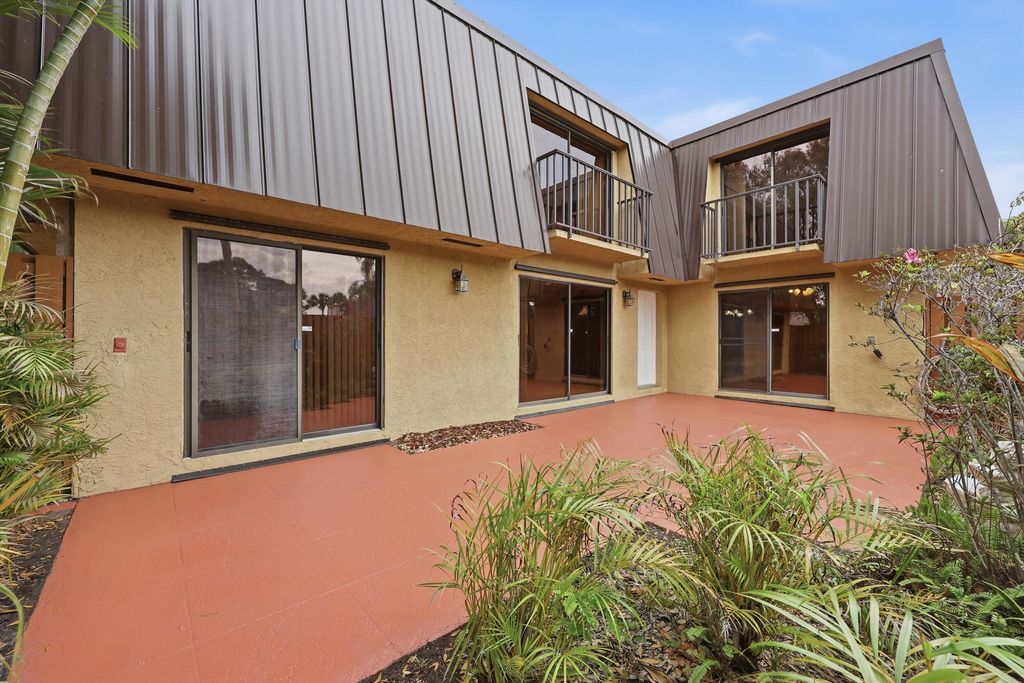 Photo of 6520 SE Windsong Lane #728, Stuart, FL 34997 (MLS # R11155479)