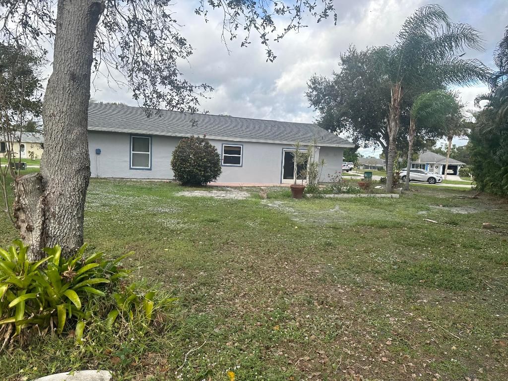 Photo of 274 NE Brunson Court, Port Saint Lucie, FL 34953 (MLS # R10943904)