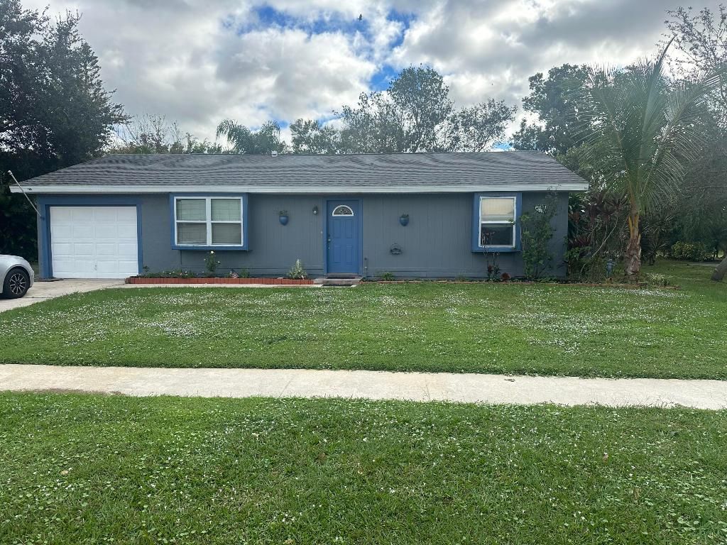 Photo of 274 NE Brunson Court, Port Saint Lucie, FL 34953 (MLS # R10943904)