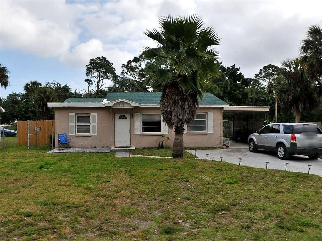 Photo of 2212 N 45th Street St, Fort Pierce, FL 34946 (MLS # R10815116)