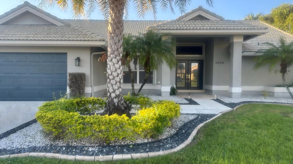Photo of 6448 Blue Bay Circle, Lake Worth, FL 33467 (MLS # B26001796)