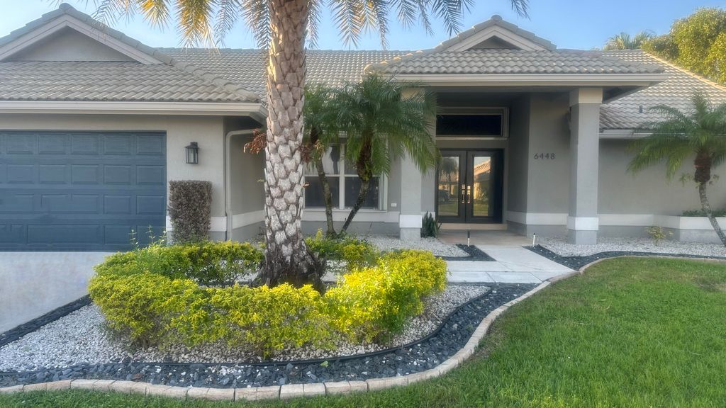 Photo of 6448 Blue Bay Circle, Lake Worth, FL 33467 (MLS # B26001796)