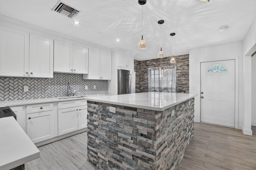 Photo of 8681 BOCA Drive #20, Boca Raton, FL 33433 (MLS # B26069380)