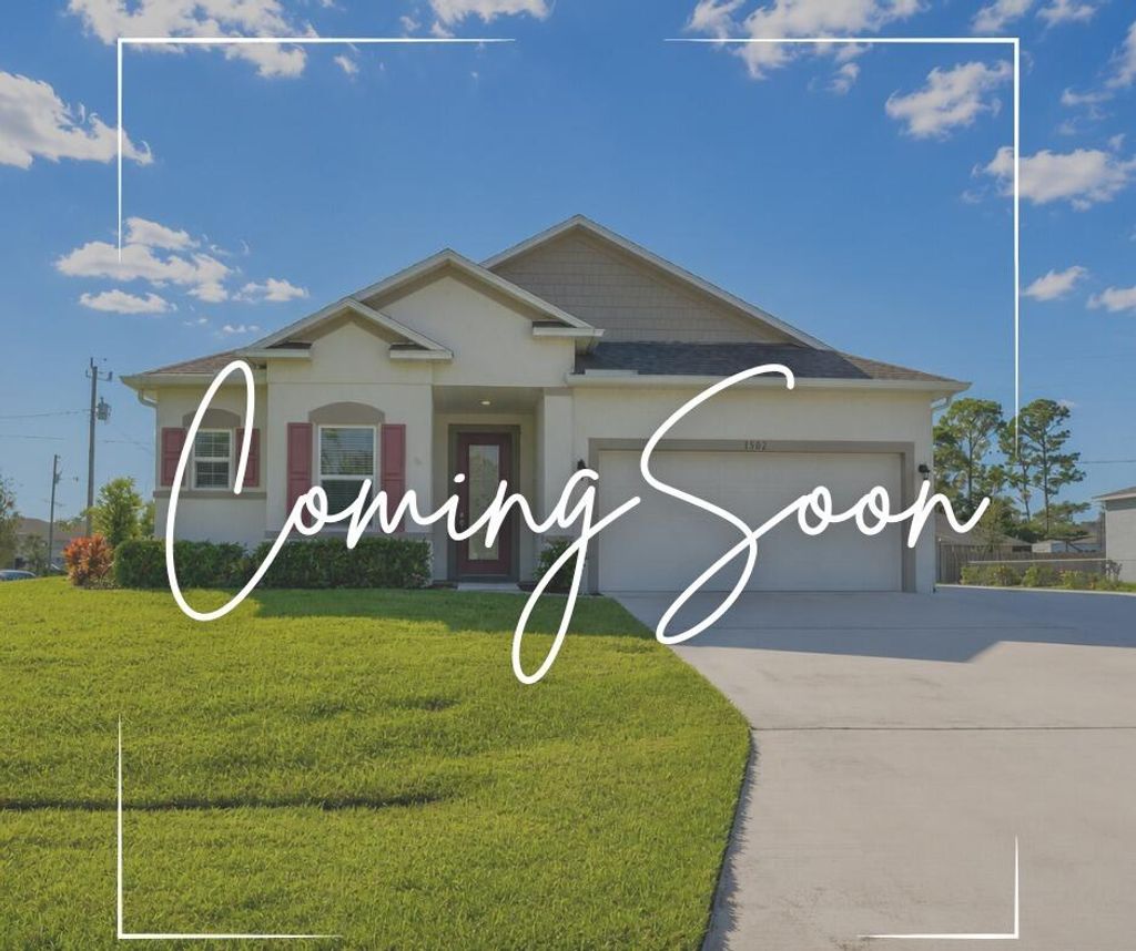 Photo of 1502 SW Kosnar Avenue, Port Saint Lucie, FL 34953 (MLS # B26029838)