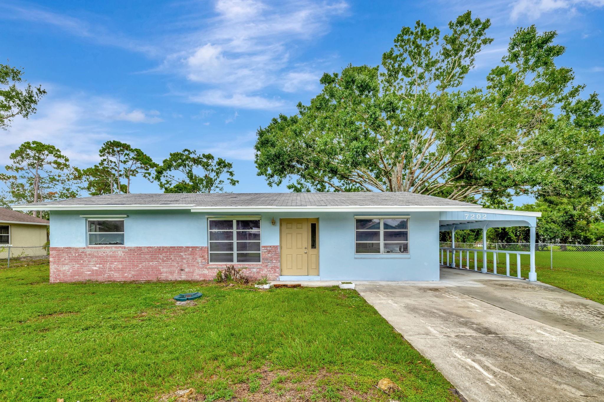 Welcome Home! Your opportunity to own a slice of Florida living! This charming home is perfect for you as a first-time homebuyer, savvy investor, or if you're seeking a cozy vacation retreat in Sunny Florida. Nestled in a quiet, friendly neighborhood, this property offers the ideal combination of comfort and convenience. Enjoy a spacious, open layout with natural light flowing throughout. The kitchen is ready for your culinary creativity, and the generous living areas are perfect for relaxing or entertaining. Step outside to a peaceful backyard with land space of over 1/4 acre, ideal for enjoying sunny Florida days. Located just minutes from shopping, dining, and pristine beaches, plus easy access to I-95 for commuting or weekend getaways. Don’t miss this chance to invest in your Legacy!