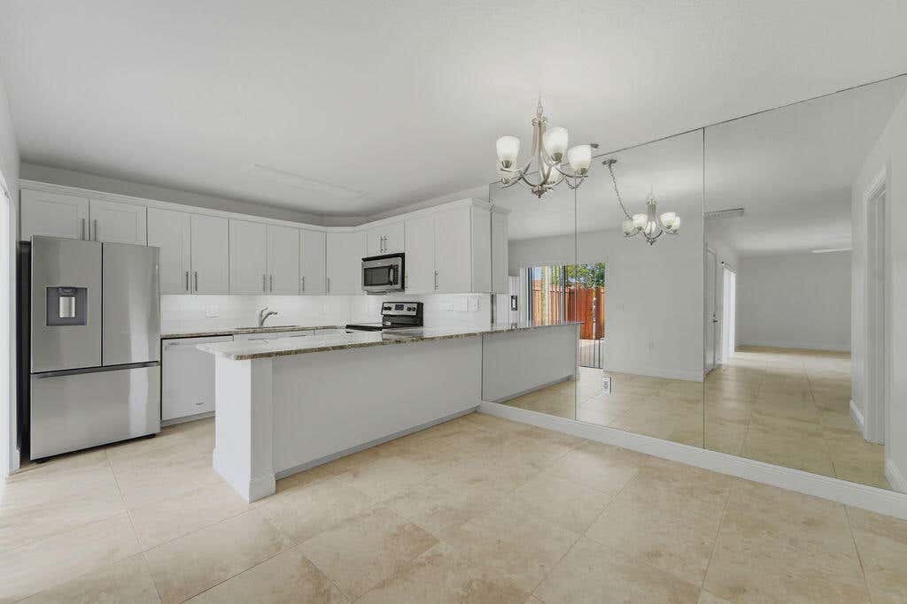 Photo of 3900 SE County Line Road, Jupiter, FL 33469 (MLS # B26068727)