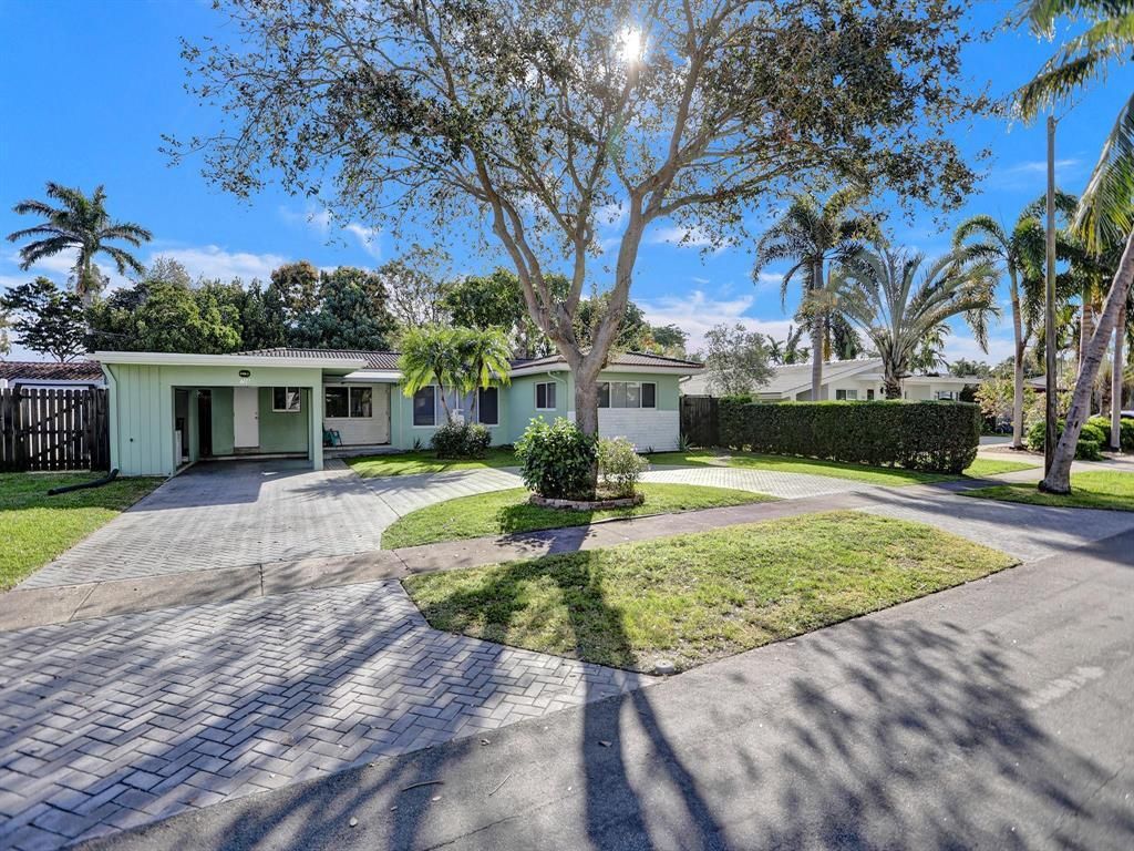 Photo of 708 NE 24th Avenue, Pompano Beach, FL 33062 (MLS # B26029993)