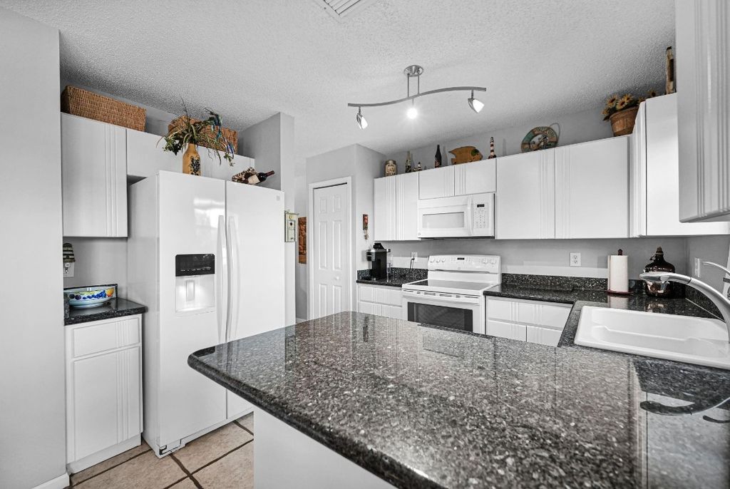 Photo of 251 W Forest Oak Circle, Davie, FL 33325 (MLS # F10543582)