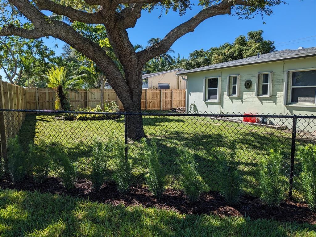 Croissant Park 2/2, Unit #1 in duplex. Lives like a house at around 1000 sq ft. Big fenced yard perfect for your pet (with owner approval, no aggressive breeds). Recently remodeled kitchen and baths. Two large bedrooms, each en suite. Bonus sunroom off kitchen, perfect for home office or dining room. Large interior utility/laundry room with full size washer/dryer. Minimum 650 credit score with no eviction history for all tenants. No smoking. 1st, last, security. Rent includes lawn maintenance. Tenant screening at $38 per occupant. Fast approval. Central heat and air. Best central location for downtown Ft Lauderdale, airport, I-95 and I-595. Available now.