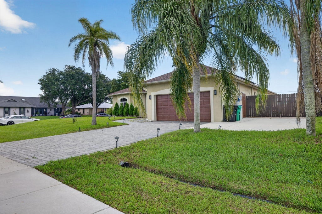 Photo of 1402 SW ABINGDON Avenue, Port Saint Lucie, FL 34953 (MLS # B26076983)