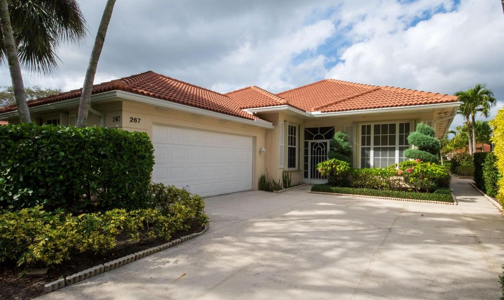 Photo of 267 Kelsey Park Circle, Palm Beach Gardens, FL 33410 (MLS # R10943134)