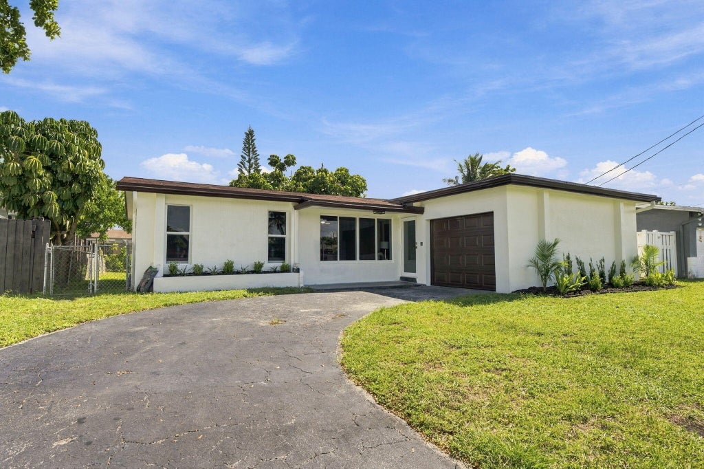 Photo of 2400 NW 85th Avenue, Sunrise, FL 33322 (MLS # B26091111)