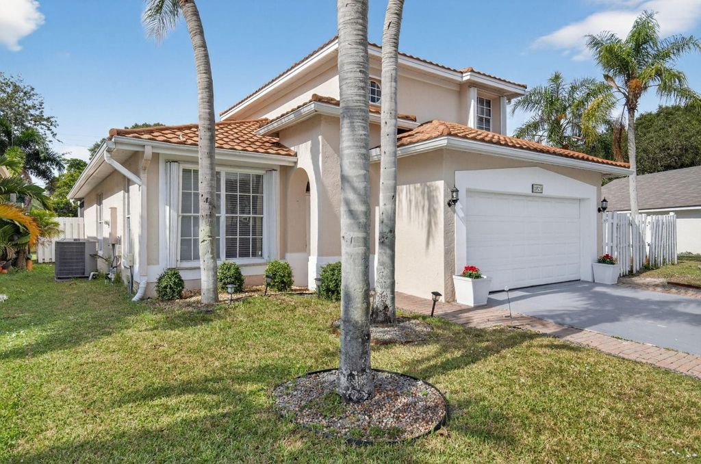 Photo of 1023 Fairfax Circle, Boynton Beach, FL 33436 (MLS # F10538800)