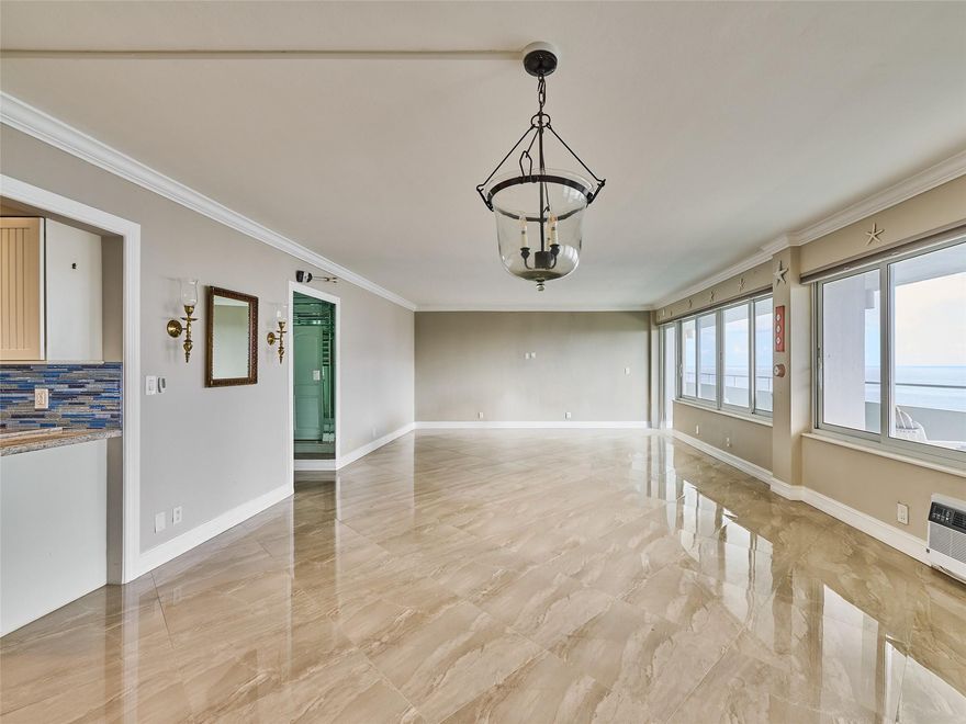 THIS STUNNING OVER SIZE UNIT HAS IT ALL ! BEAUTIFULLY RENOVATED,EXPANSIVE) DIRECT OCEAN VIEWS, LOCATED IN THE BEAUTIFUL SEASIDE TOWN OF LAUDERDALE BY THE SEA (AS FEATURED IN SOUTHERN LIVING MAGAZINE ) . IMPACT DOORS AND WINDOWS, STAINLESS STEEL, GRANITE, CUSTOM CABINETRY WITH PULL DRAWERS, GORGEOUS TILE BACKSPLASH,HUGE DINING AND LIVINGROOM ,  WALK-IN CLOSET, LINEN CLOSET, GUEST ROOM FEATURES BUILT IN  STORAGE AND DESK, LUXURY BATHS, LARGE BALCONY SPACE, ENJOY THE HEATED POOL THAT OVER LOOKS THE BEACH  WALK THRU THE GATE RIGHT OUT TO THE SAND,  2 BBQ AREAS, 24 HR SECURITY, EXERCISE ROOM, AND THE LOCATION DOESN'T GET ANY BETTER, EASY WALK TO RESTAURANTS, ENTERTAINMENT, SHOPPING .  THIS IS A MUST SEE PROPERTY A LARGE 2/2 BEAUTIFULLY RENOVATED, WITH WIDE OPEN OCEAN VIEWS, AND BEST LOCATION IN FLORIDA