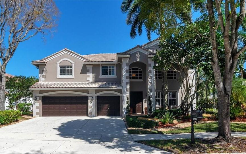 Stunning 5-bedroom, 4-bathroom estate offering over 4,200 sq. ft. of luxurious living space, situated on an oversized lot in the prestigious gated community of The Ridges in Weston, FL. This beautifully maintained home features a spectacular pool and expansive patio area, perfect for outdoor entertaining and relaxation. Renovated Kitchen and Baths and new paint! Located within a top-rated A+ school district, the community provides a family-friendly environment with convenient access to major highways, shopping, dining, and more. A rare opportunity to own in one of Weston's most sought-after neighborhoods!