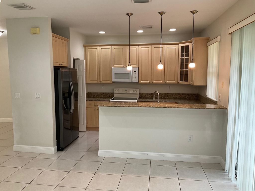 Photo of 6639 Hidden Cove Drive #4-7, Davie, FL 33314 (MLS # B26014119)