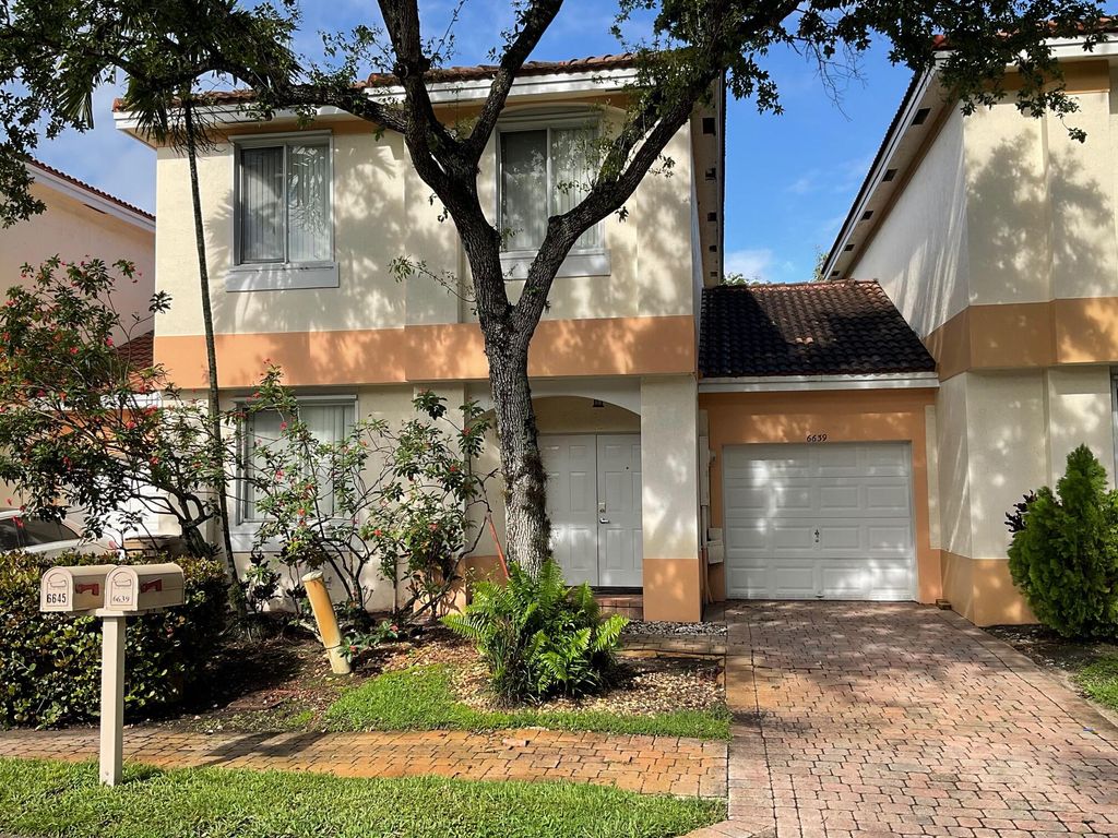 Photo of 6639 Hidden Cove Drive #4-7, Davie, FL 33314 (MLS # B26014119)