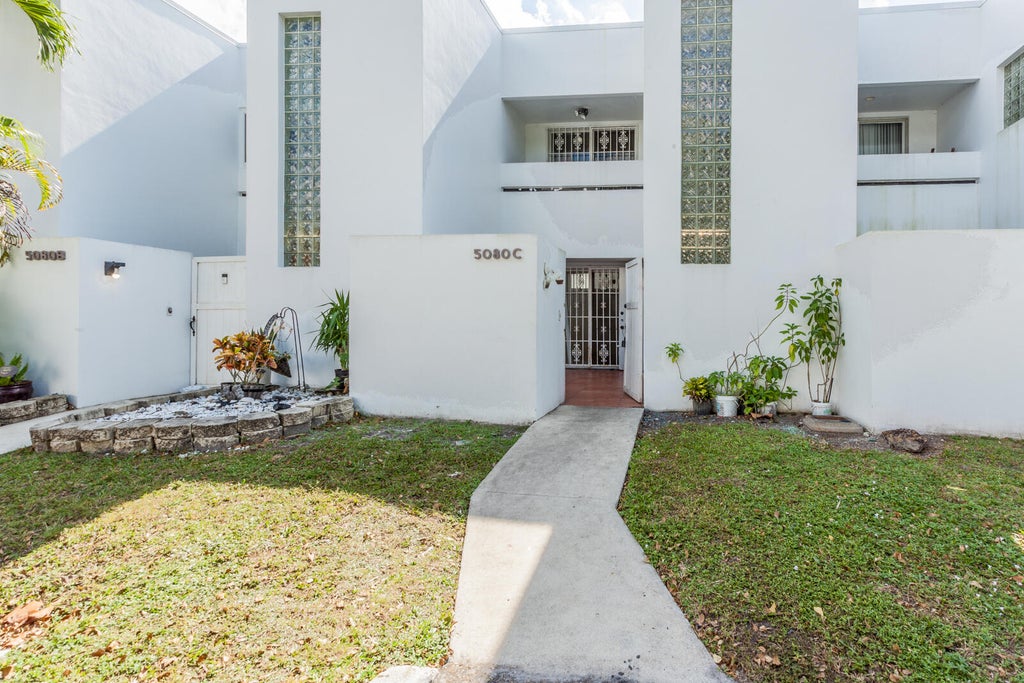 Photo of 5080 Elmhurst Road N #C, West Palm Beach, FL 33417 (MLS # B26045570)
