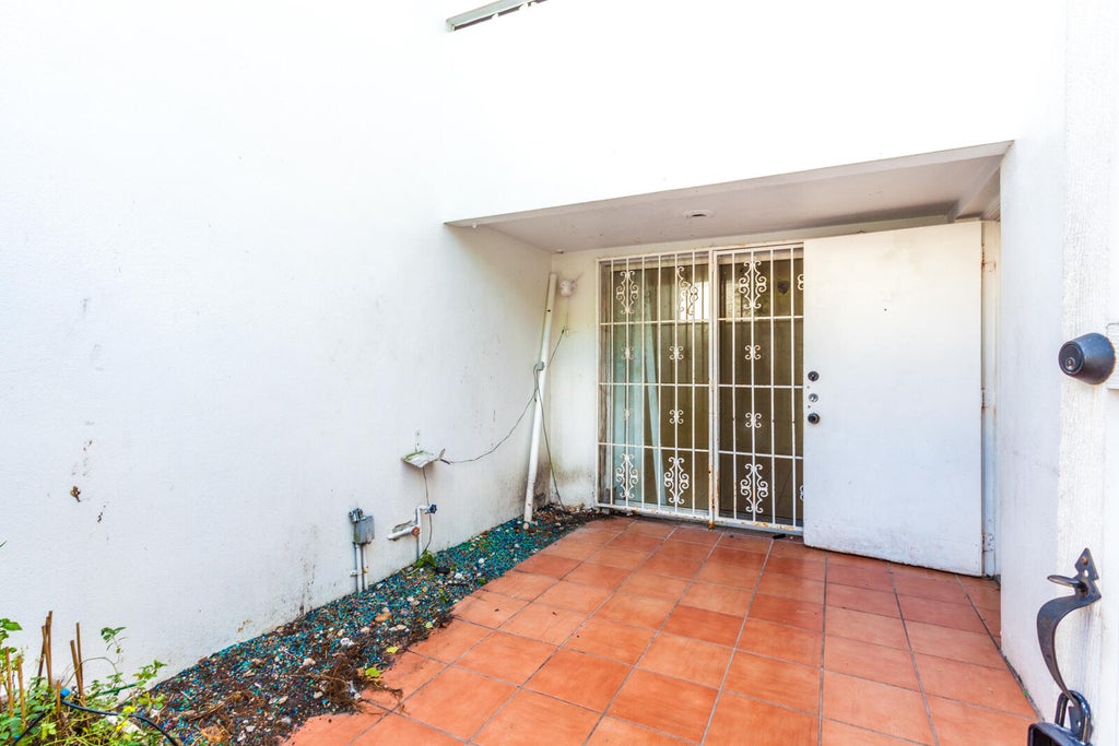 Photo of 5080 Elmhurst Road N #C, West Palm Beach, FL 33417 (MLS # B26045570)