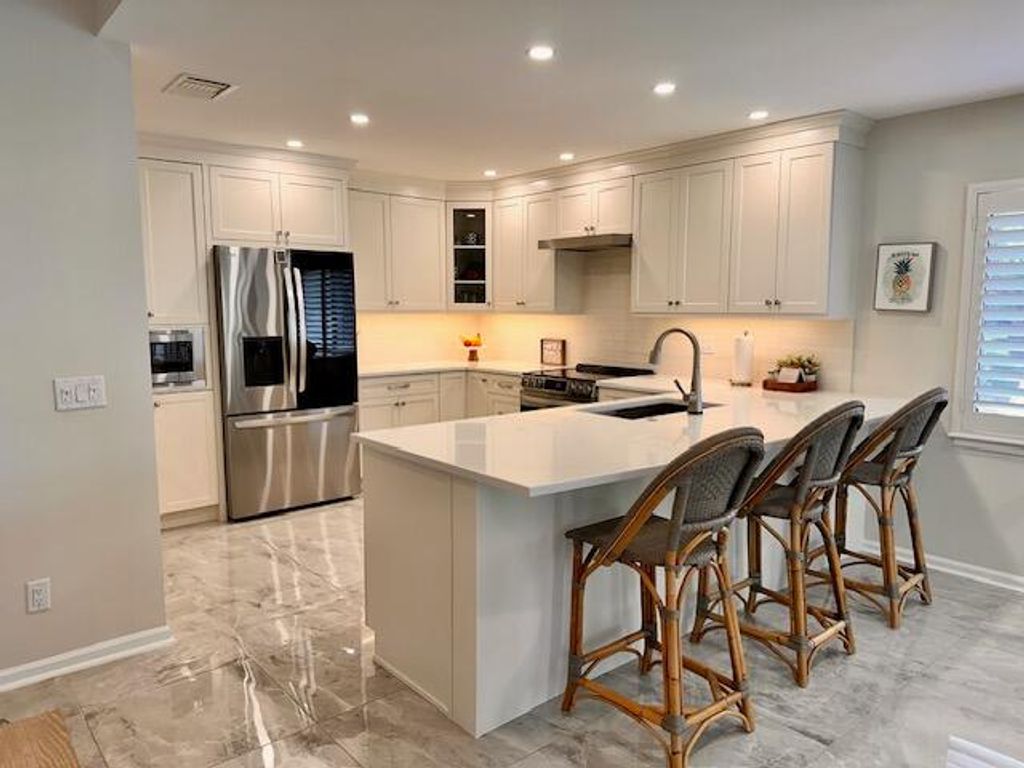 Photo of 6404 SE Brandywine Court #204, Stuart, FL 34997 (MLS # R10978430)